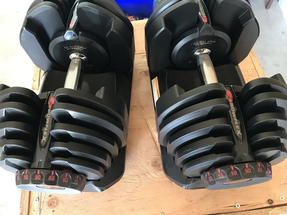 Bowflex SelectTech 1090 adjustable dumbbells (pair) with dumbbell stand