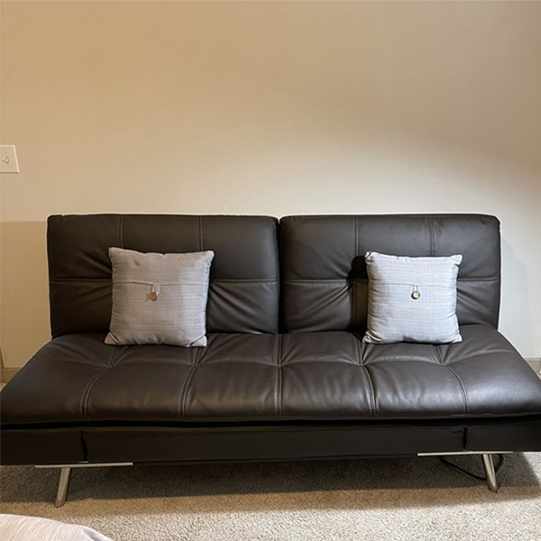 DHP Emily is bedded with chrome legs and black faux leather