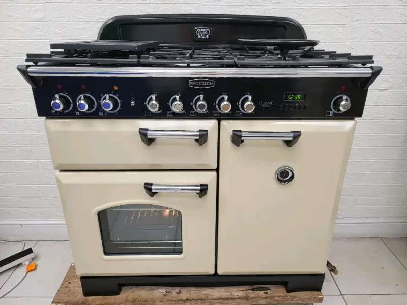 Rangemaster Classic Deluxe Dual Fuel Range Cooker in Cream 100cm