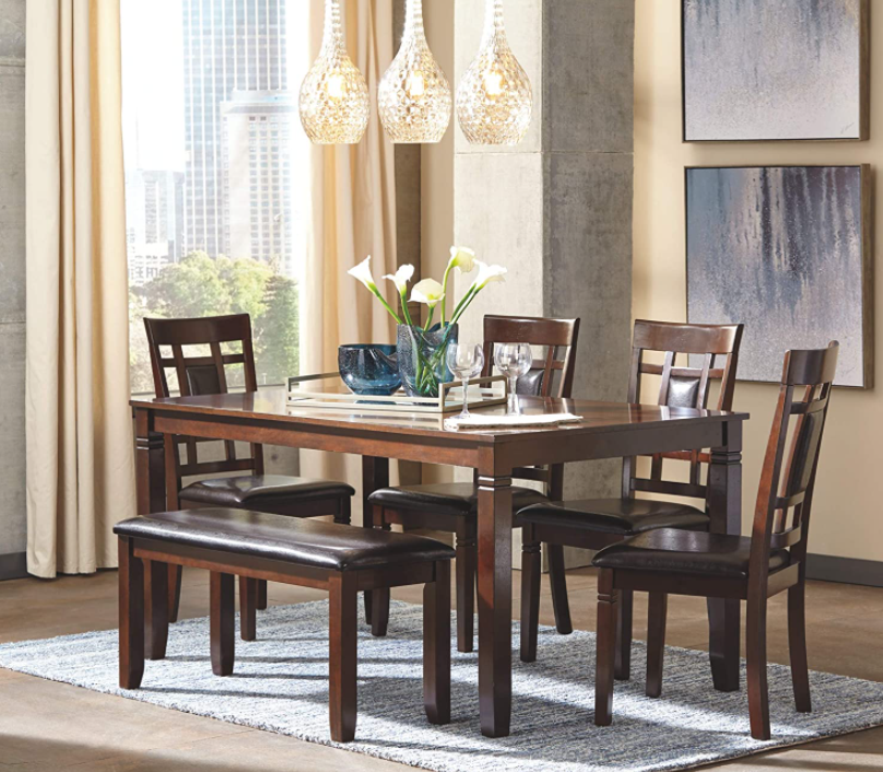Signature Design by Ashley Bennox Dining Room Set, Includes Table, 4 Chairs & Bench