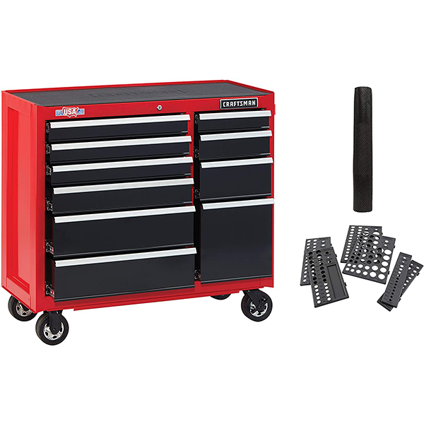 Tool cabinet with drawer lining roll and sleeve organizer